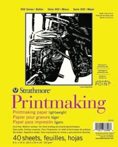 Strathmore Printmaking paper package with black and white art and yellow background
