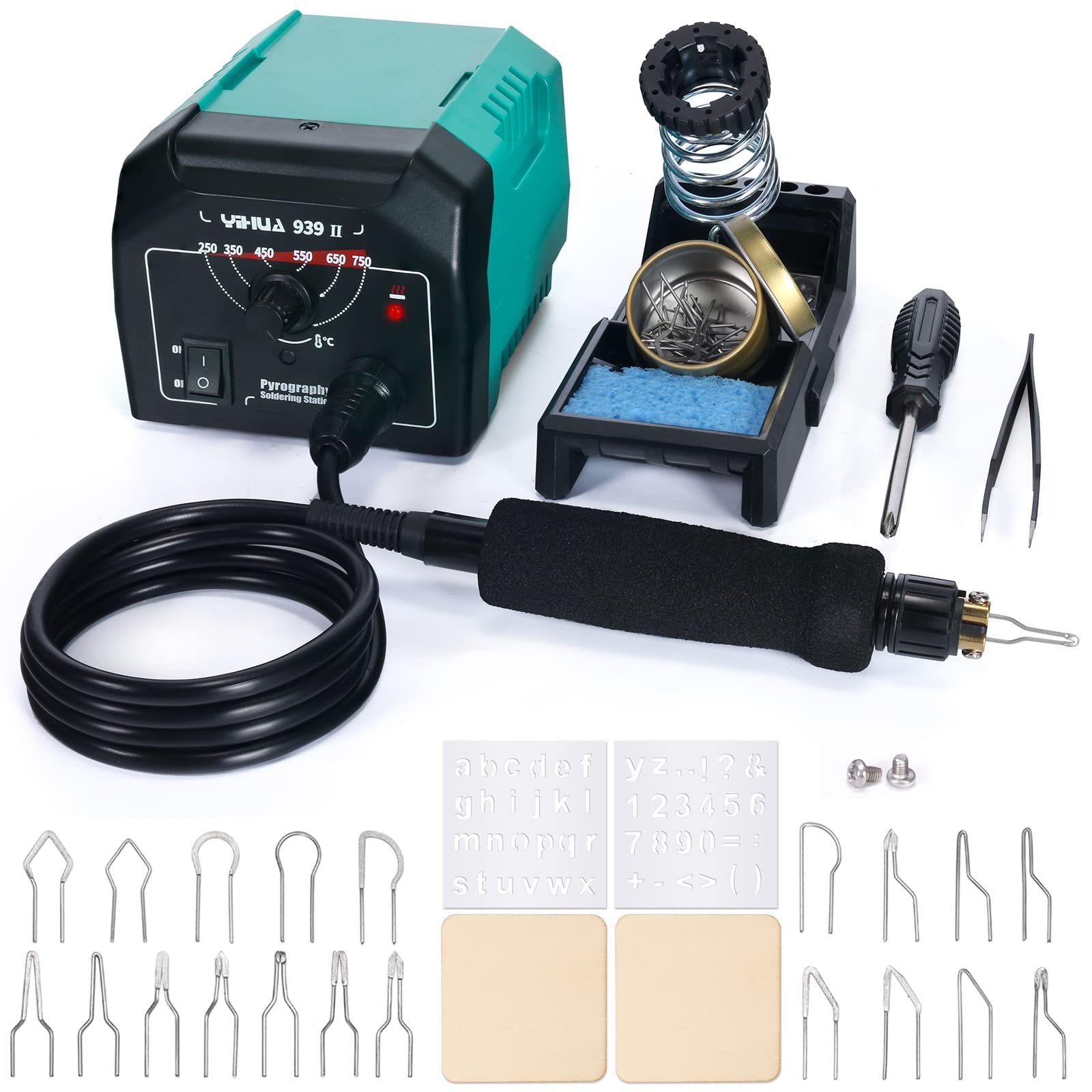 Soldering station with pyrography pen, tips, stencils, and accessories on white background
