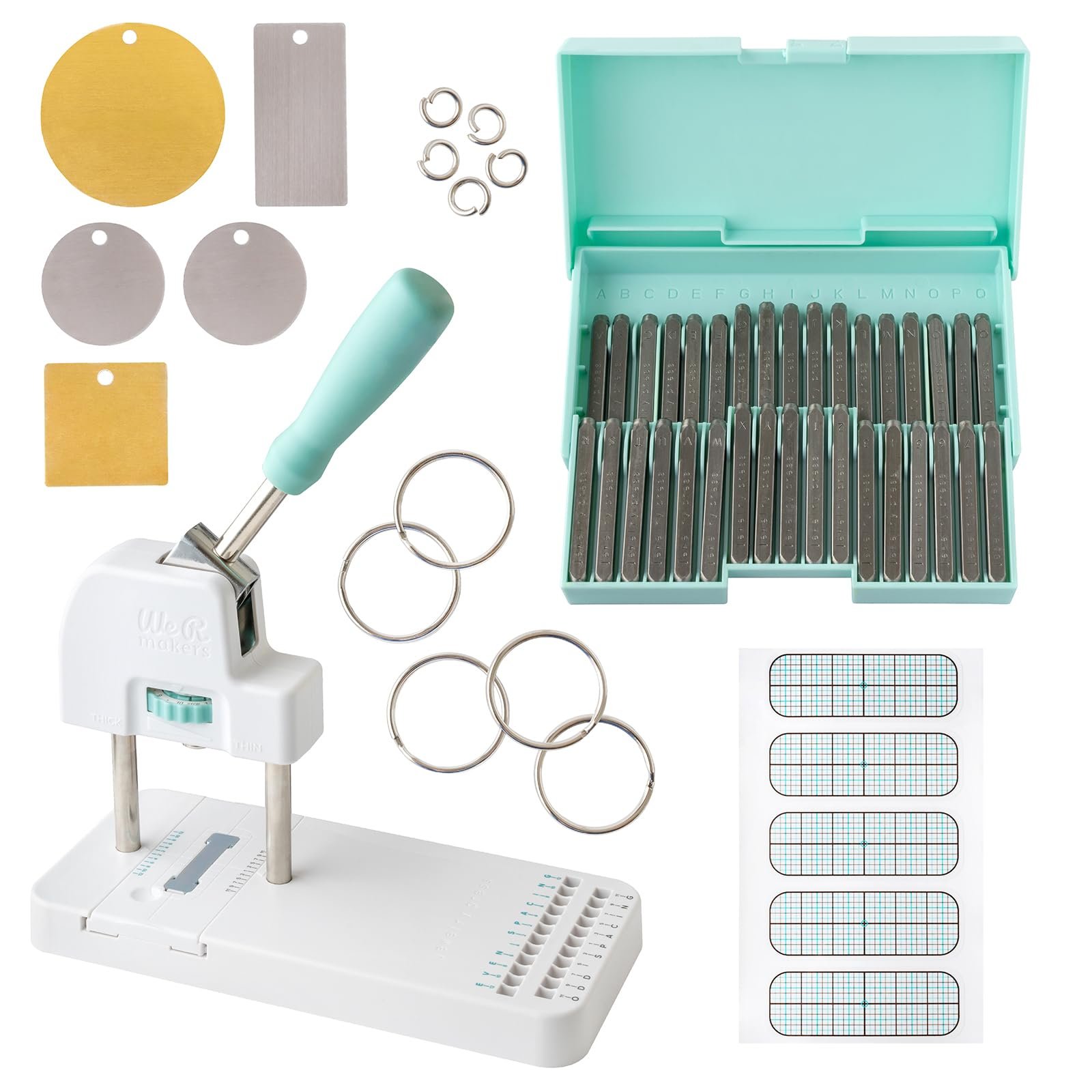 Metal stamping kit with punch, letter stamps, blanks, and key rings