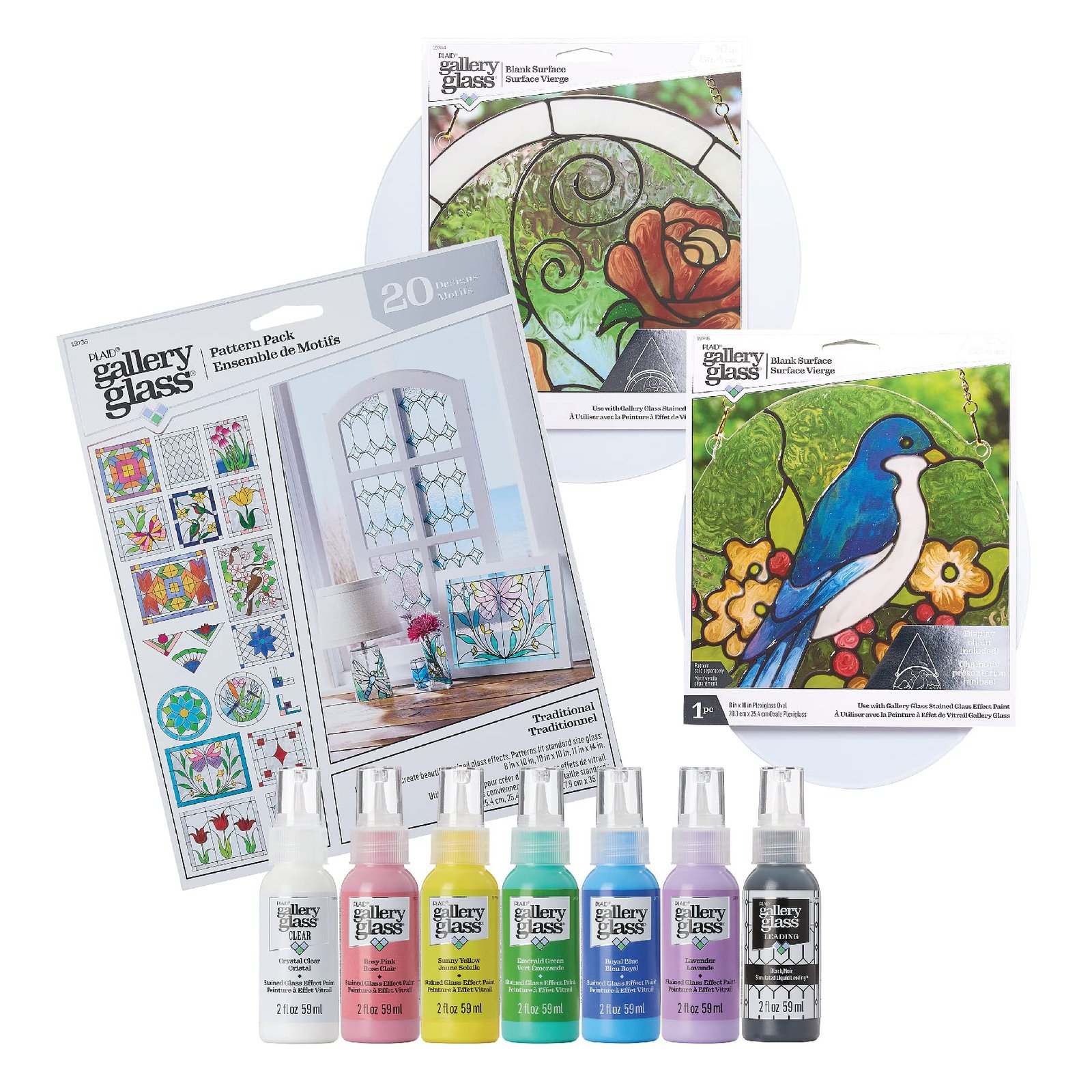 Stained glass art supplies, including paints, patterns, and blank surfaces with rose and bird designs
